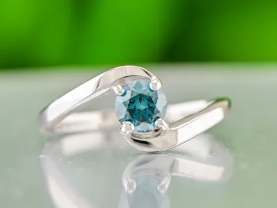 Inel de argint cu diamant albastru